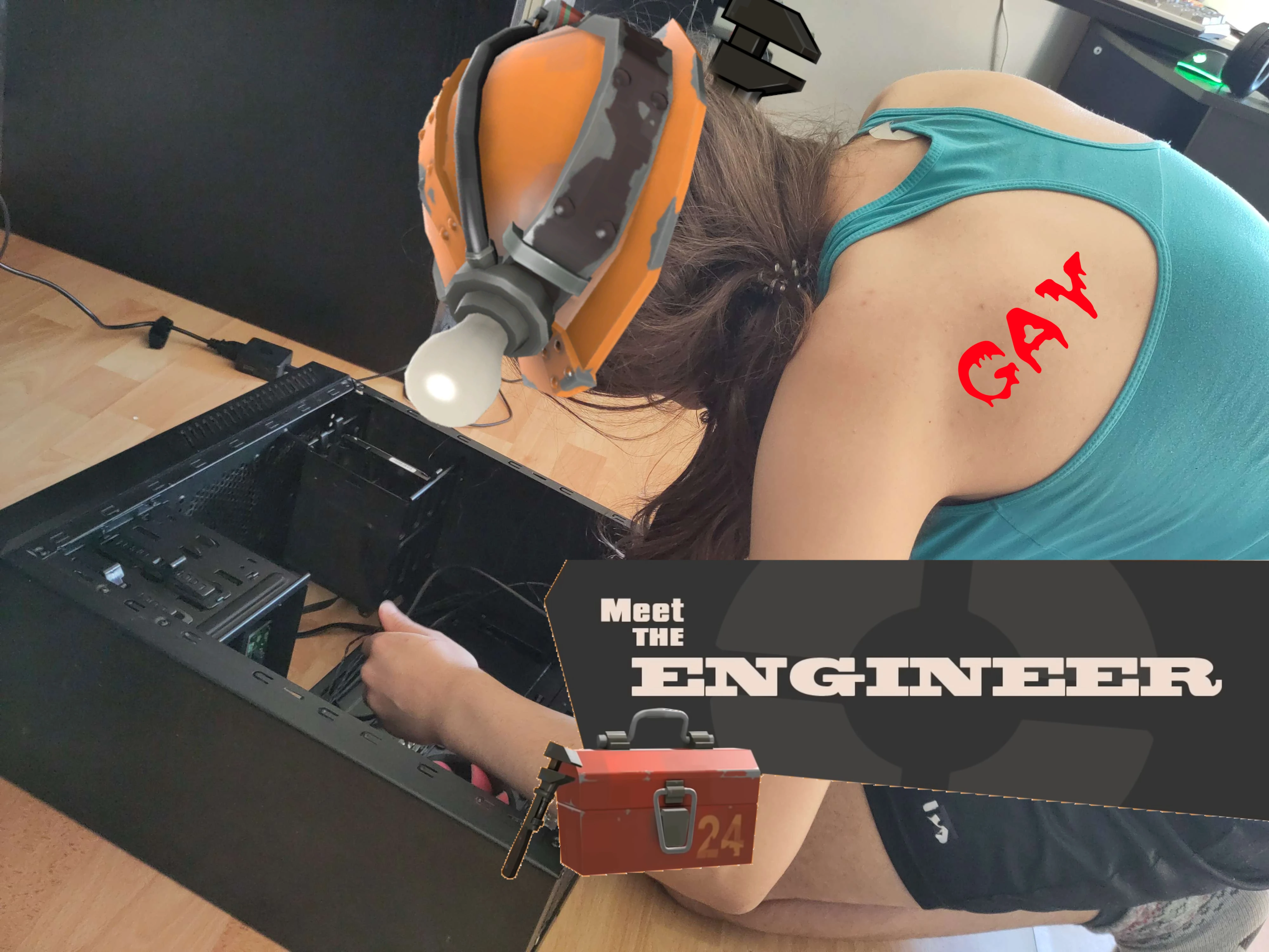 Me fixing a computer with a wrench and an hard hat edited, With the caption "Meet the engineer" from TF2