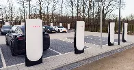 Tesla unveils V4 Supercharger with credit card reader, subsidy measure?