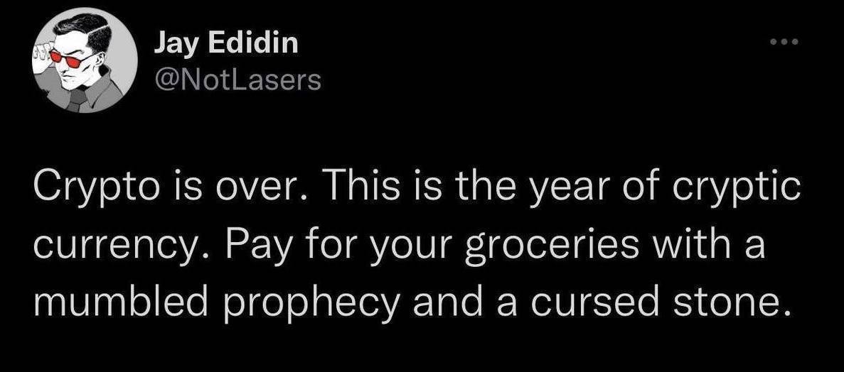 Twitter shitpost, reading "Crypto is over. This is the year of cryptic currency. Pay for your groceries with a mumbled prophecy and a cursed stone."