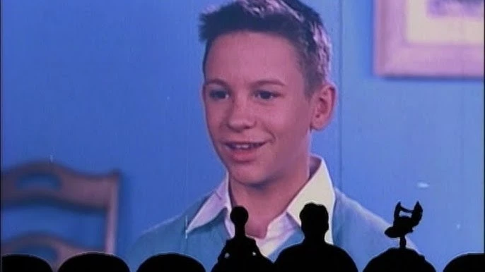 Screenshot from MST3k short &quot;Mr B Natural&quot; with a kid who has a haircut similar to OP